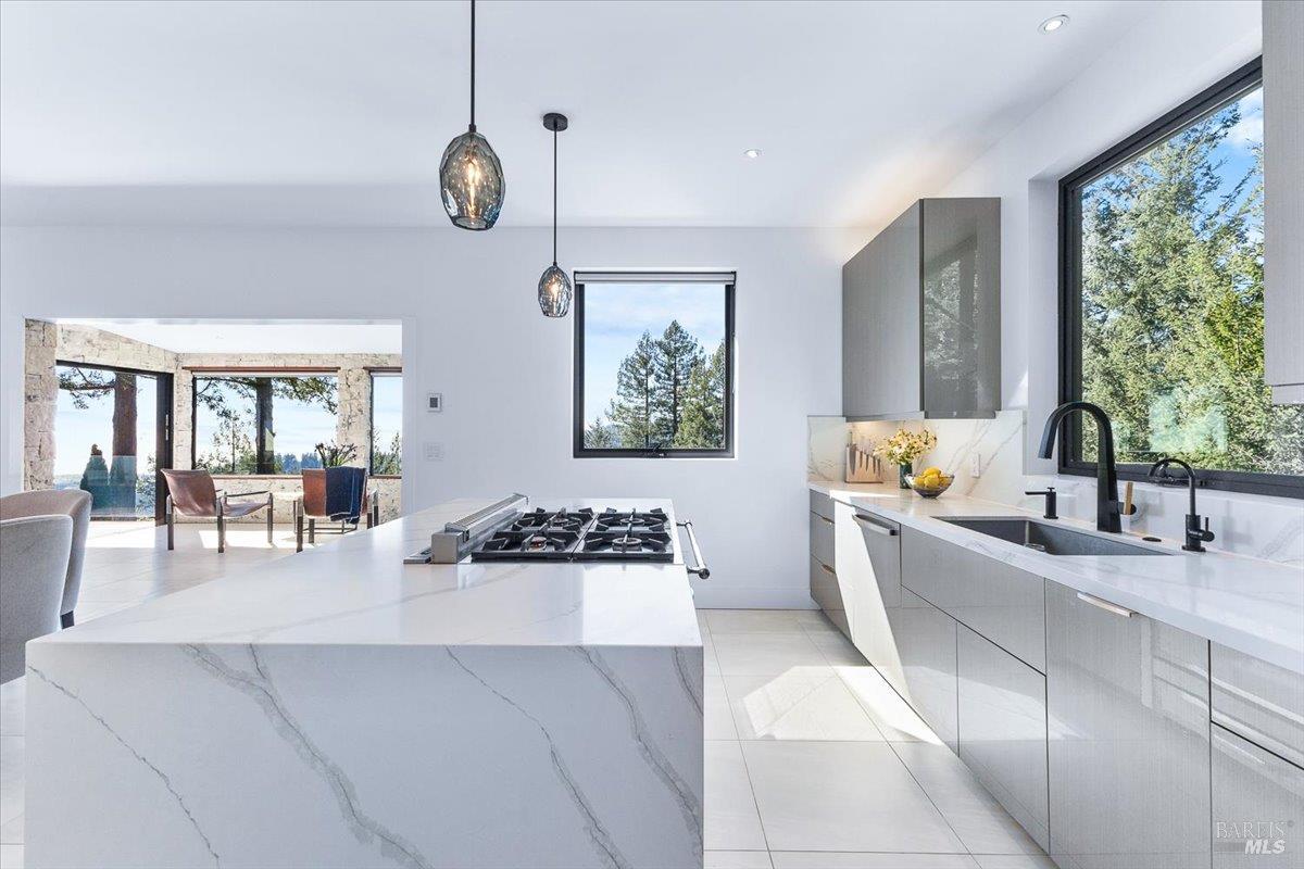 3100 Muniz Ranch Road Jenner, CA 95450 - Photo 15 of 62 Waterfall quartz island and countertops with Viking Stove