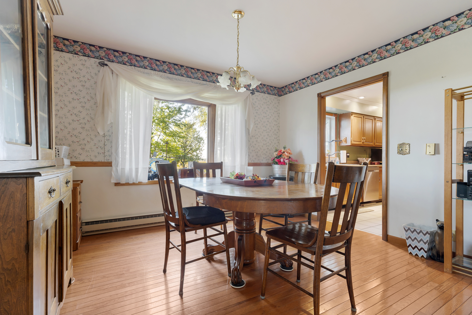 16200 Green Road Harvard, IL 60033 - Photo 6 of 30 a view of a dining room with furniture window and wooden floor