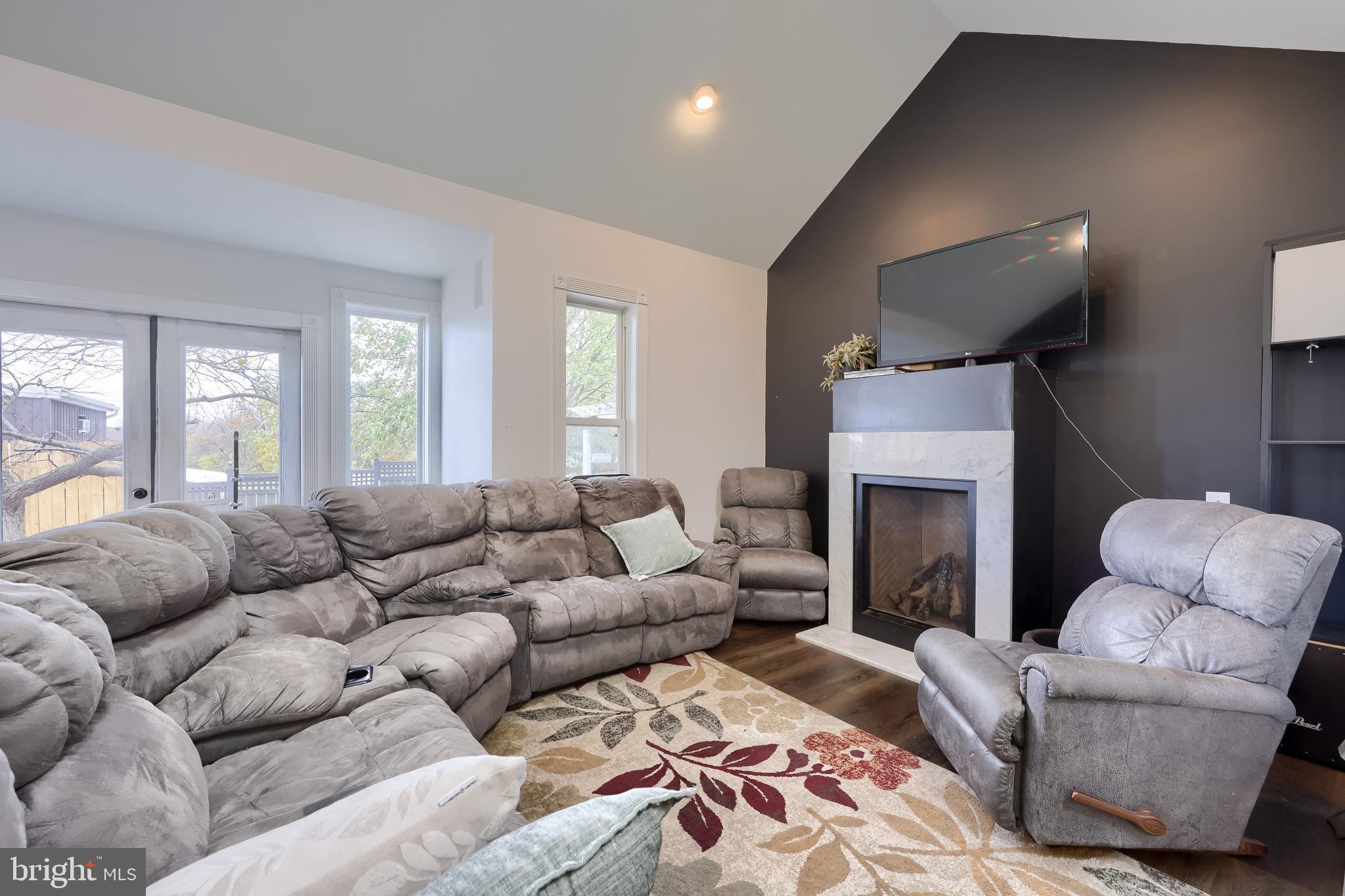 837 Centerville Road Lancaster, PA 17601 - Photo 14 of 91 a living room with furniture and a fireplace