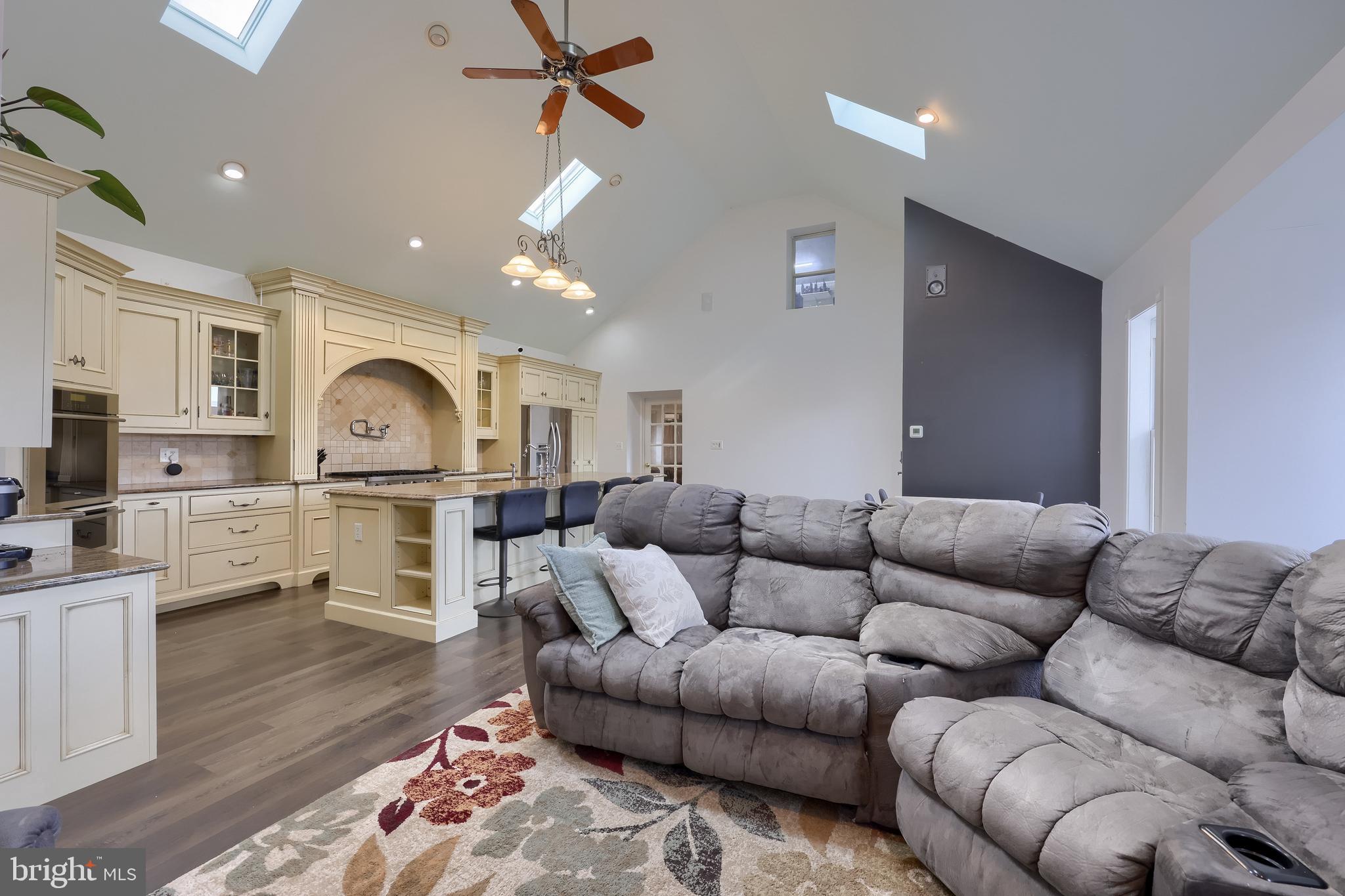 837 Centerville Road Lancaster, PA 17601 - Photo 15 of 91 a living room with furniture kitchen view and a wooden floor