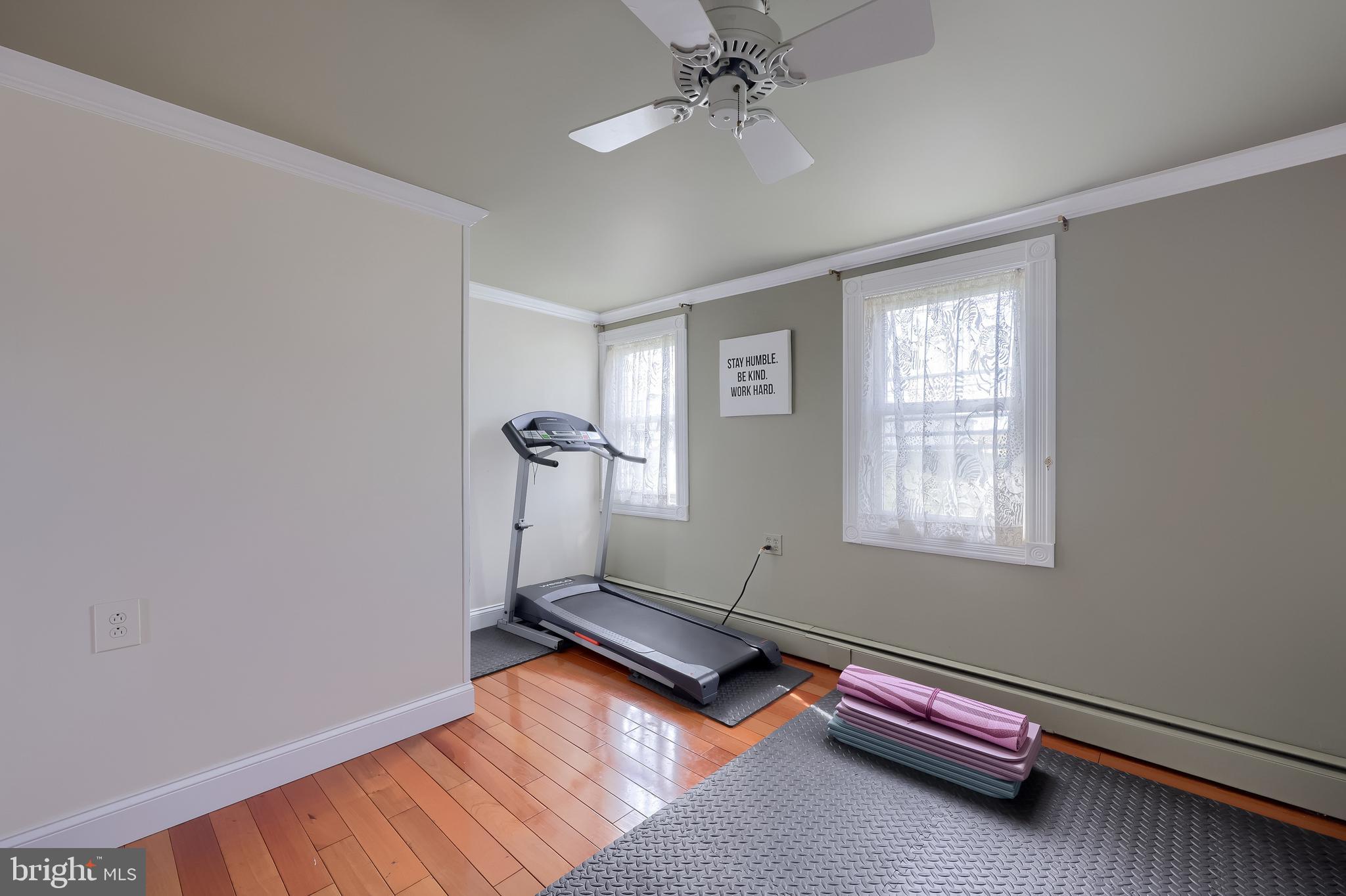 837 Centerville Road Lancaster, PA 17601 - Photo 26 of 91 a room with gym equipment with wooden floor