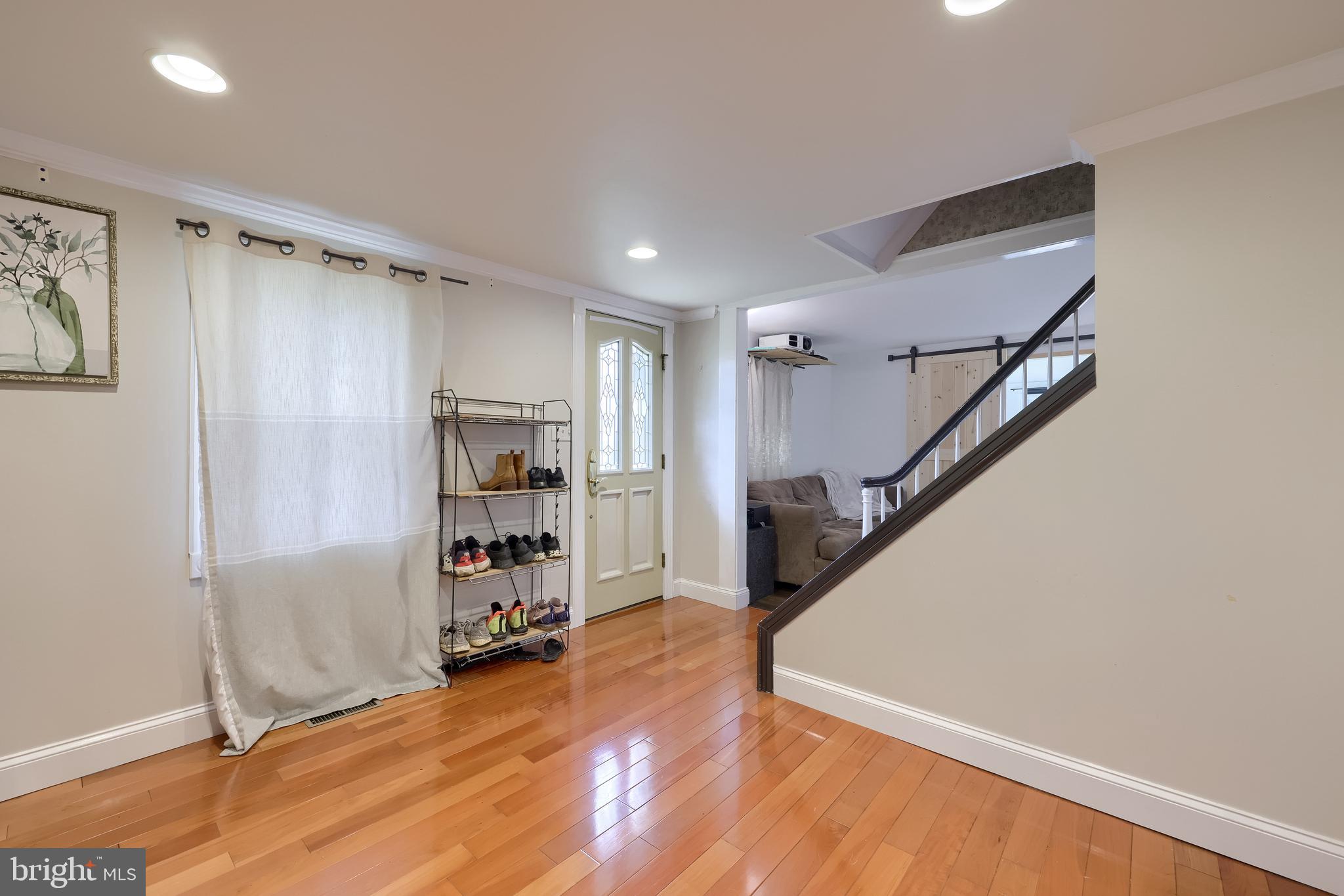 837 Centerville Road Lancaster, PA 17601 - Photo 39 of 91 a view of a livingroom with wooden floor and stairs