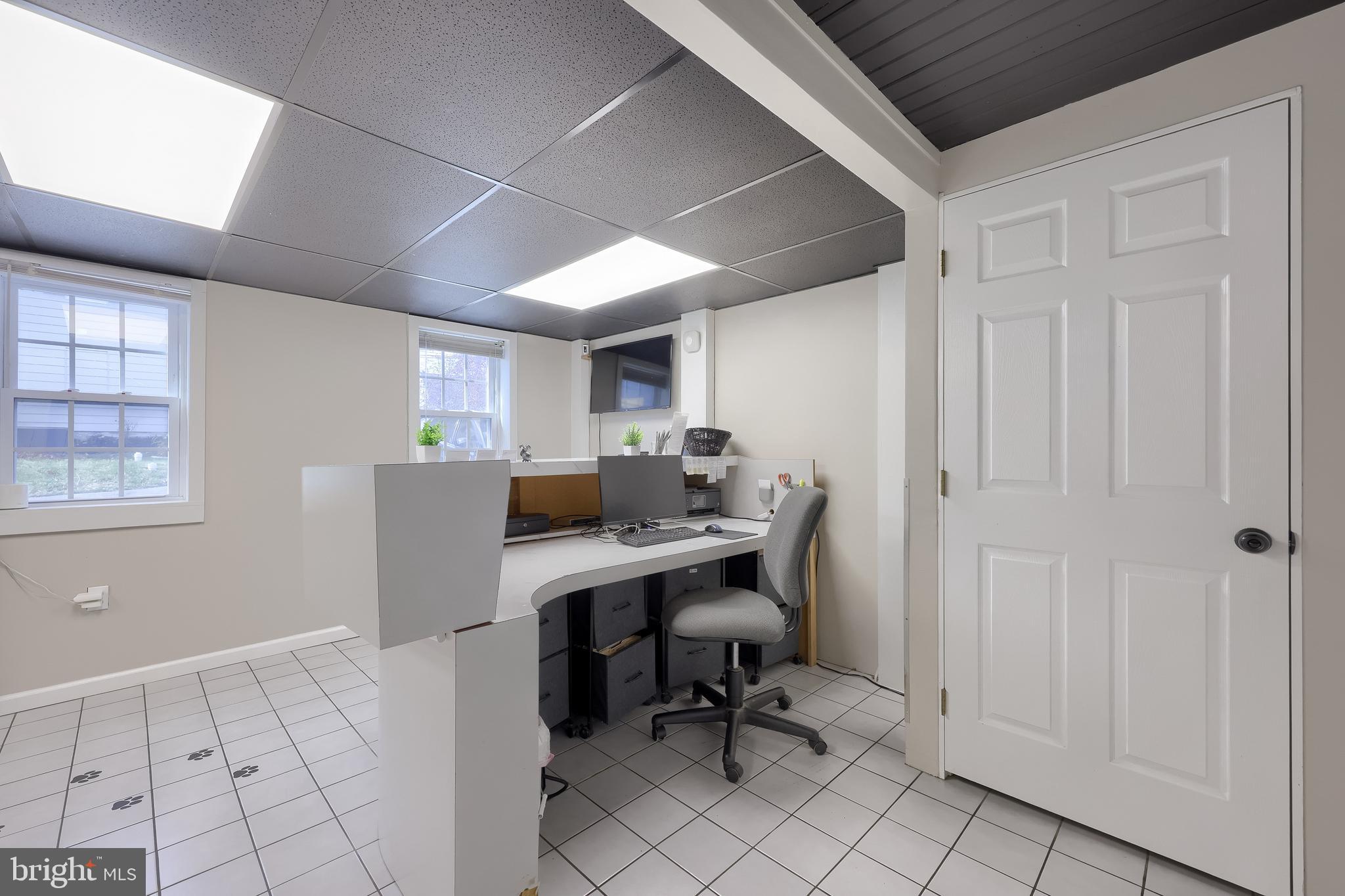 837 Centerville Road Lancaster, PA 17601 - Photo 73 of 91 a view of a workspace with furniture and a window