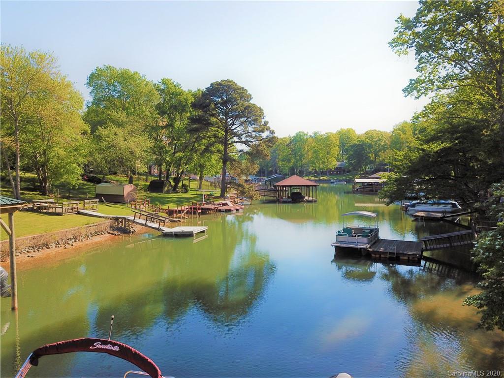3472 Lake Shore Road South Denver, NC 28037 - Photo 1 of 31 a view of a lake with houses