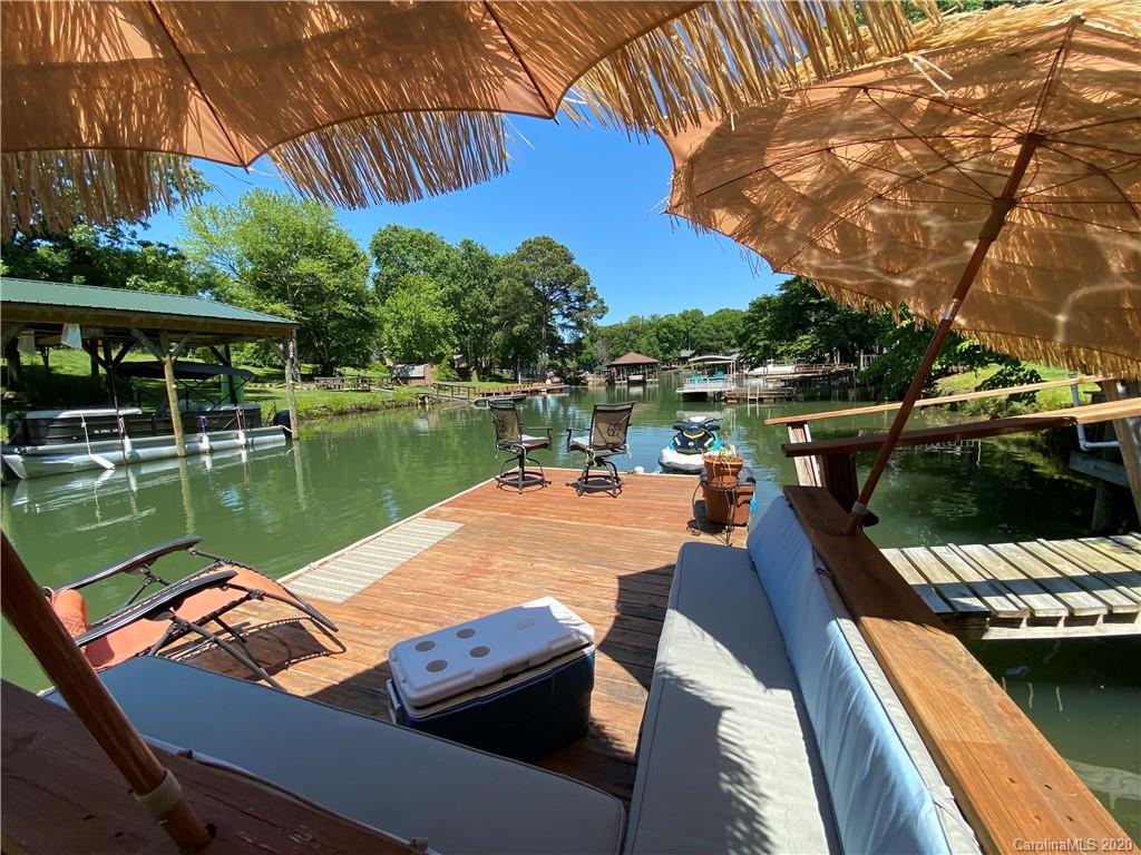 3472 Lake Shore Road South Denver, NC 28037 - Photo 10 of 31 a view of a lake with a deck