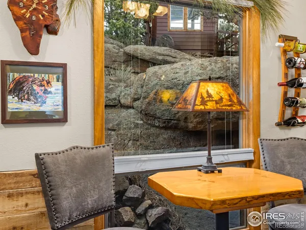 a room with table and chairs