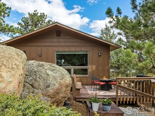 a view of house with patio outdoor seating