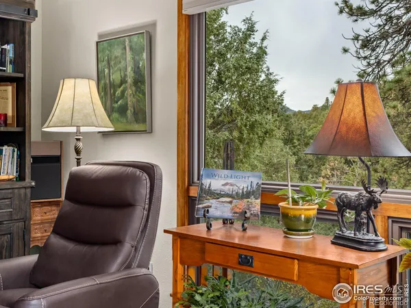 a room with furniture and a lamp