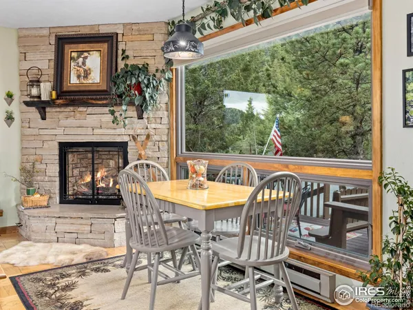 a view of a patio with a table and chairs