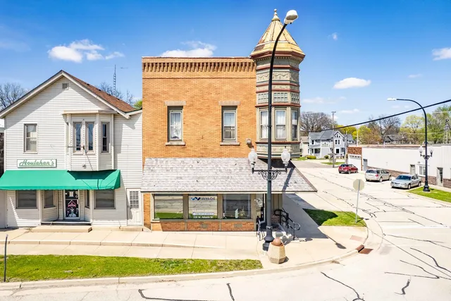 a view of houses with a street
