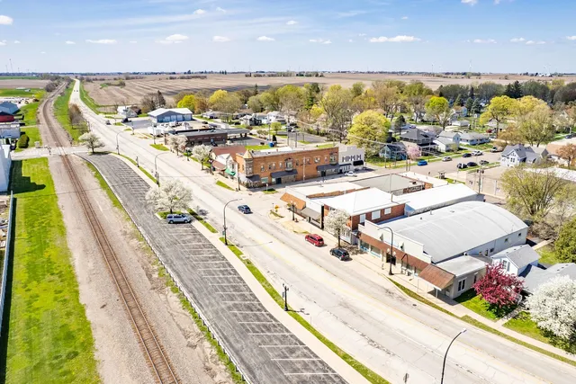 a view of multiple houses with a yard