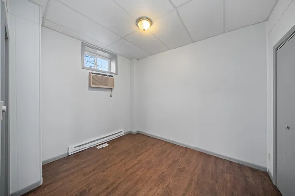 a view of cabinets and wooden floor