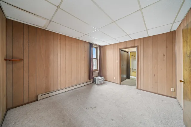 a view of a room with a large window