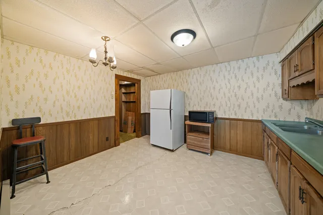 a bathroom with a sink a mirror and a bathtub
