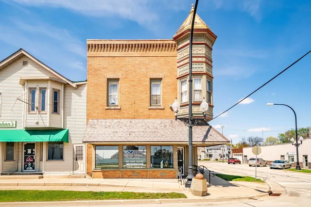 a view of swimming pool with outdoor seating