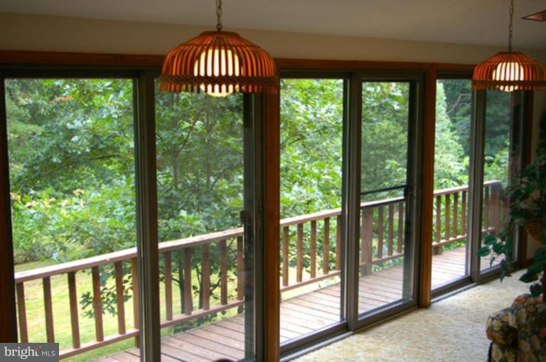 2566 Tabor Road Berkeley Springs, WV 25411 - Photo 3 of 10 Sunroom