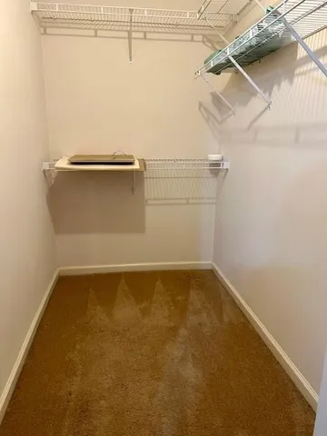 a view of a room with racks on the wall