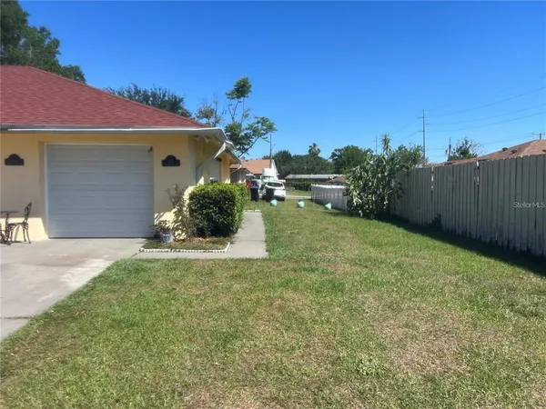a house view with a garden space