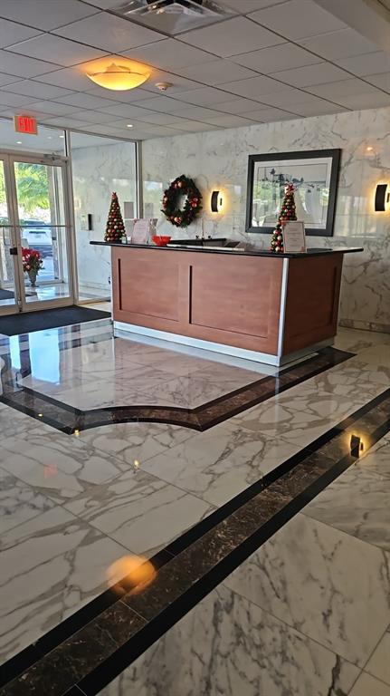 a view of living room with furniture and window