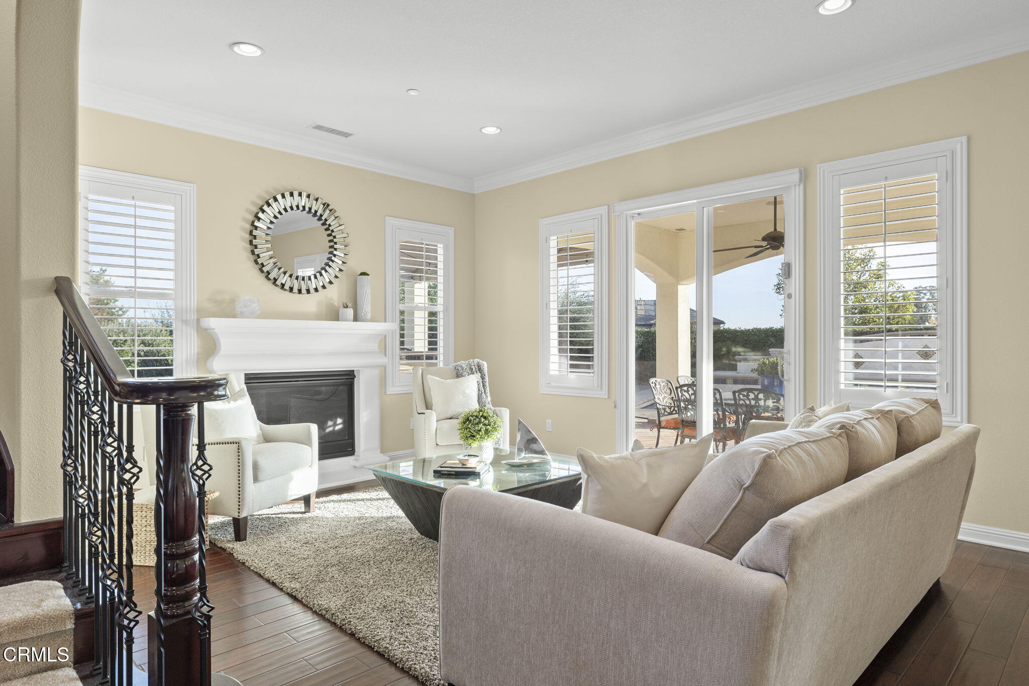 7391 Elk Run Way Moorpark, CA 93021 - Photo 13 of 56 a living room with furniture fireplace and window
