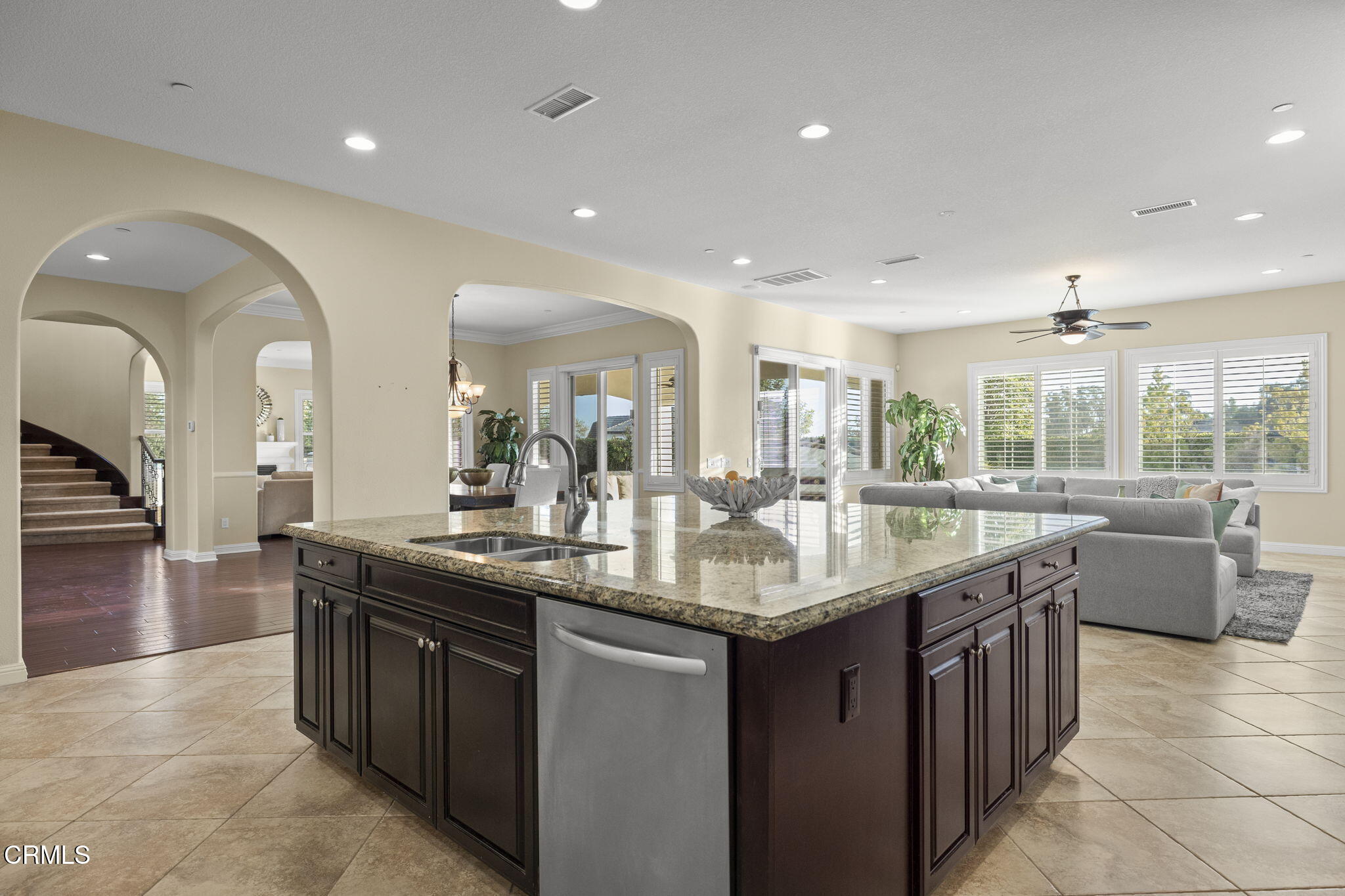 7391 Elk Run Way Moorpark, CA 93021 - Photo 18 of 56 a dining hall with stainless steel appliances granite countertop a lot of counter space and living room view