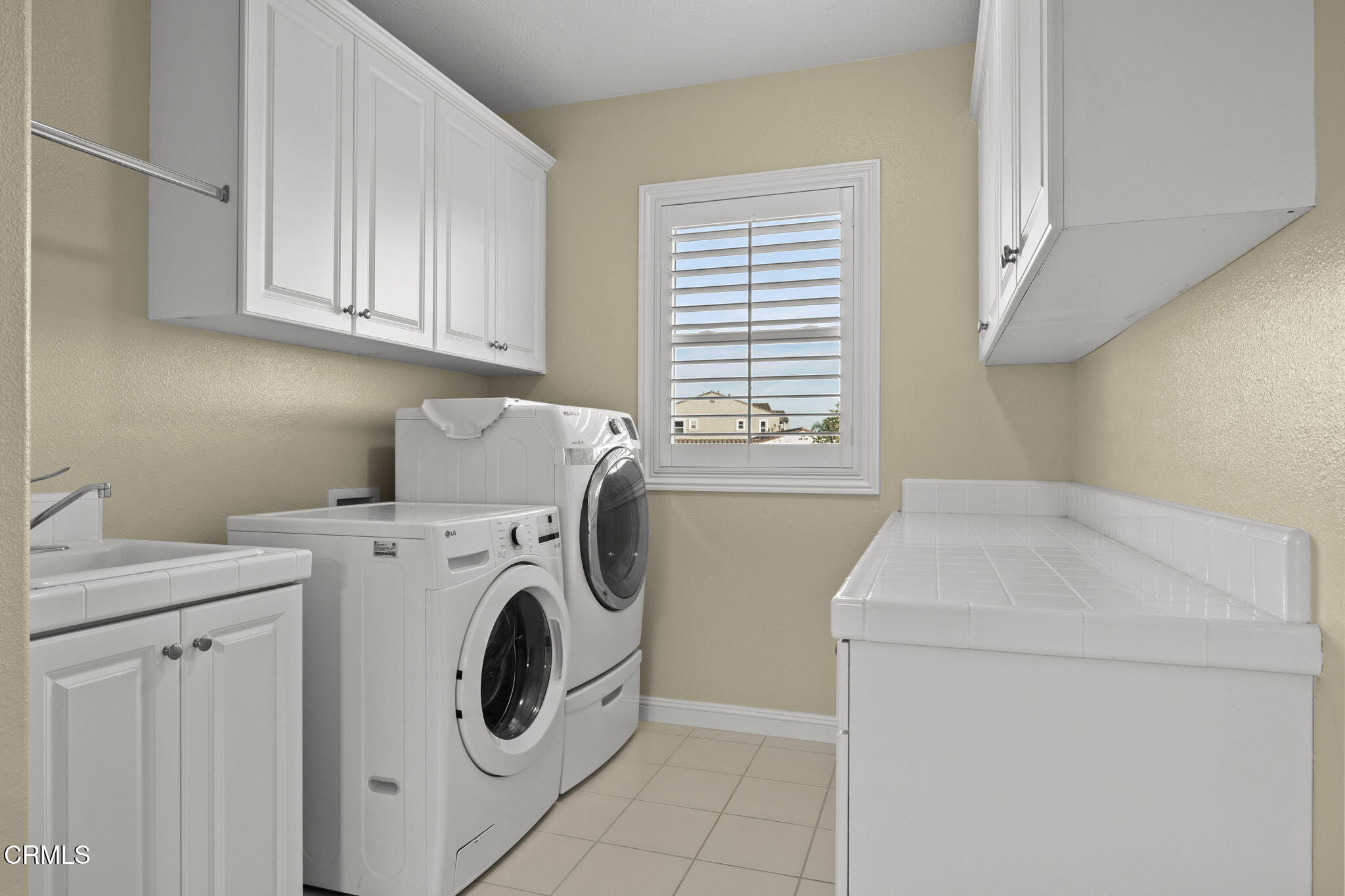 7391 Elk Run Way Moorpark, CA 93021 - Photo 31 of 56 a utility room with dryer and washer