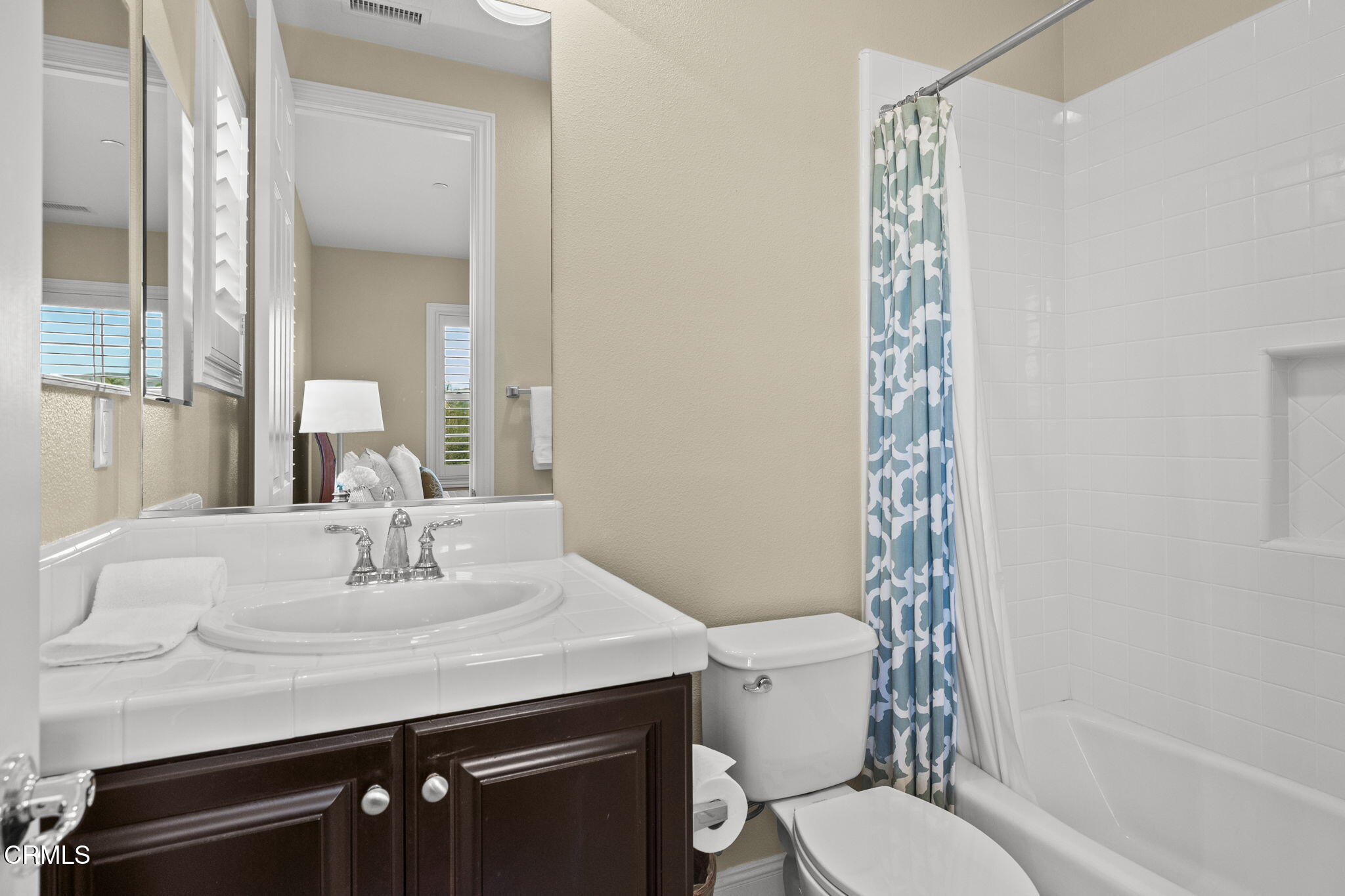 7391 Elk Run Way Moorpark, CA 93021 - Photo 33 of 56 a bathroom with a sink toilet and shower