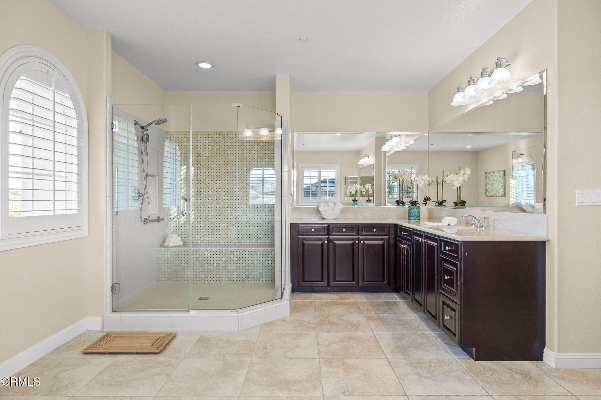 7391 Elk Run Way Moorpark, CA 93021 - Photo 43 of 56 a bathroom with a granite countertop sink mirror and shower
