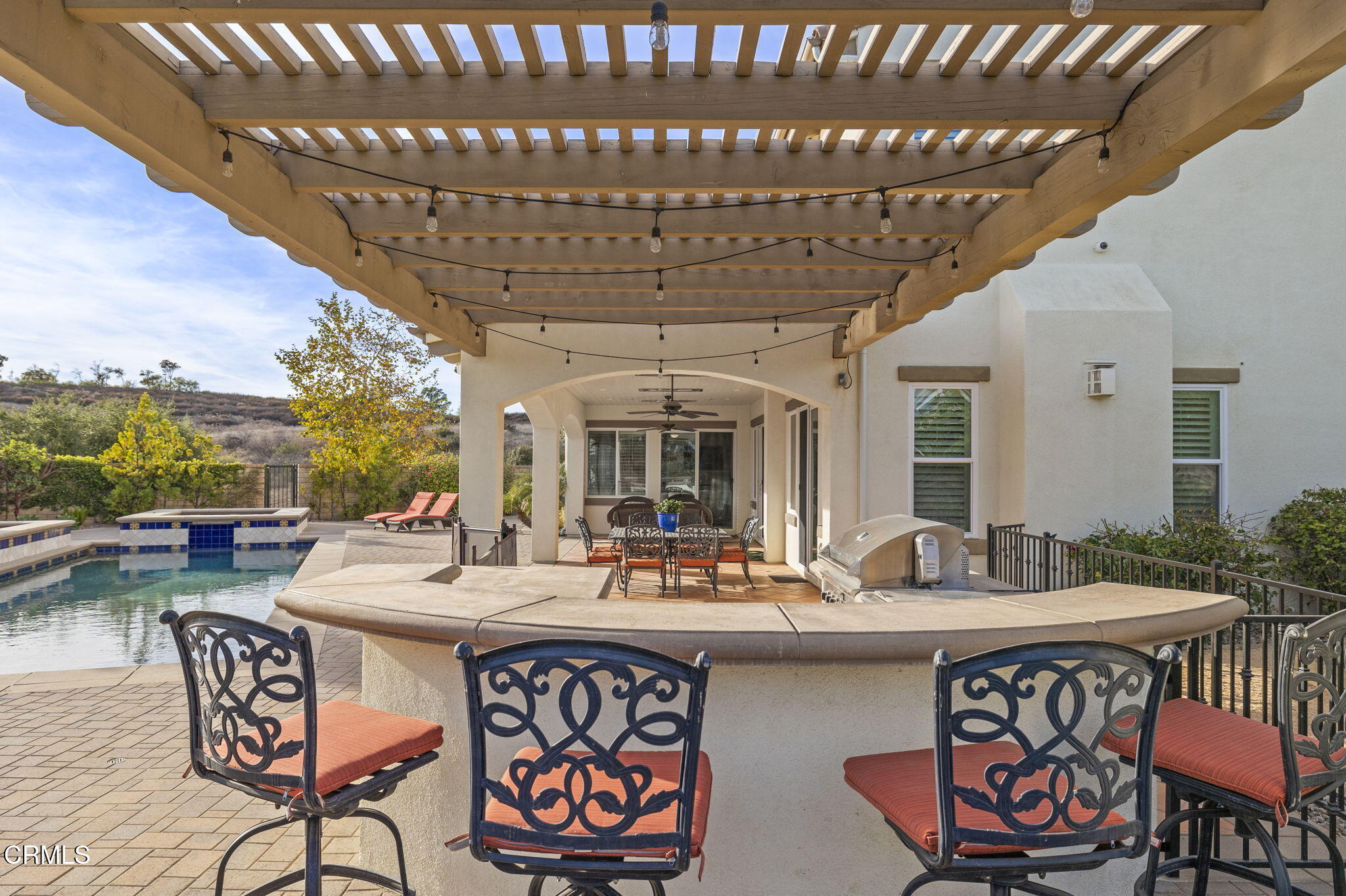 7391 Elk Run Way Moorpark, CA 93021 - Photo 47 of 56 a living room with patio furniture and a fireplace