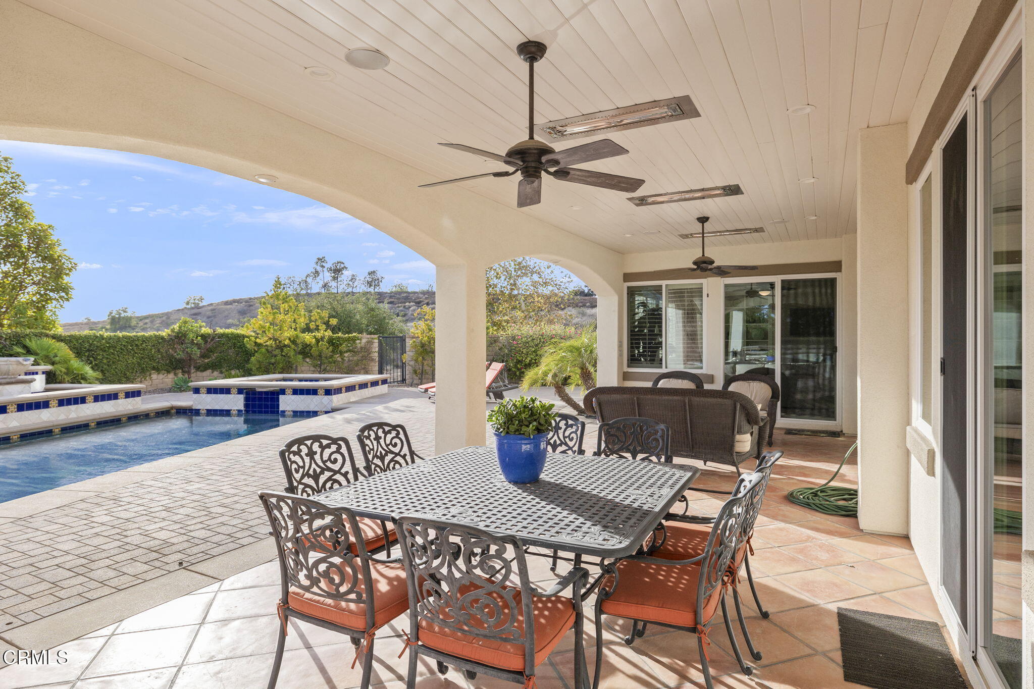 7391 Elk Run Way Moorpark, CA 93021 - Photo 48 of 56 a view of a patio with a dining table and chairs