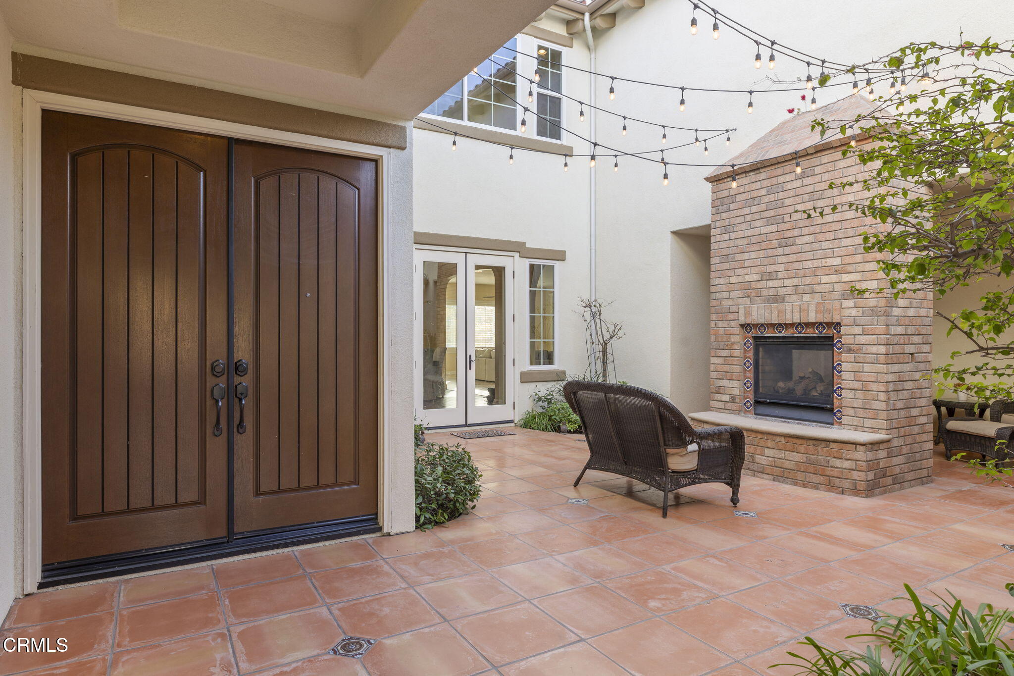 7391 Elk Run Way Moorpark, CA 93021 - Photo 5 of 56 a living room with furniture and a fireplace