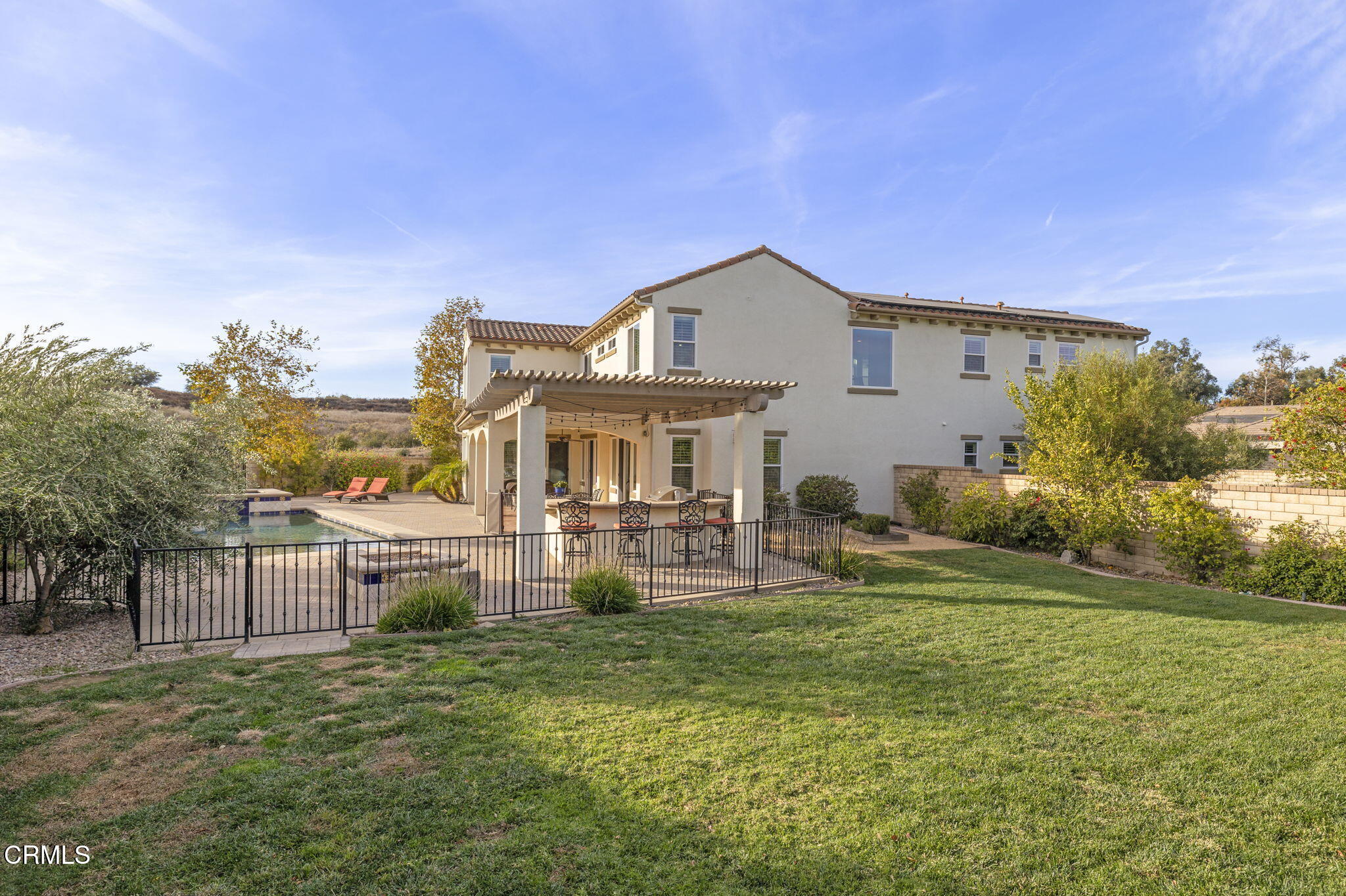 7391 Elk Run Way Moorpark, CA 93021 - Photo 53 of 56 a front view of house with outdoor seating and green space