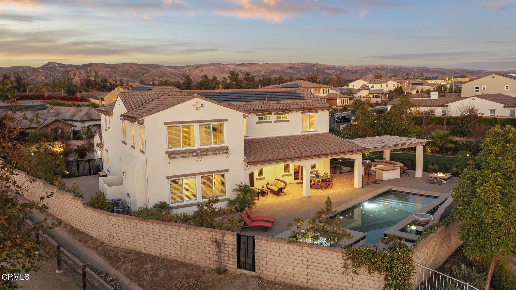 7391 Elk Run Way Moorpark, CA 93021 - Photo 54 of 56 an aerial view of a house with a yard pool outdoor seating and city view