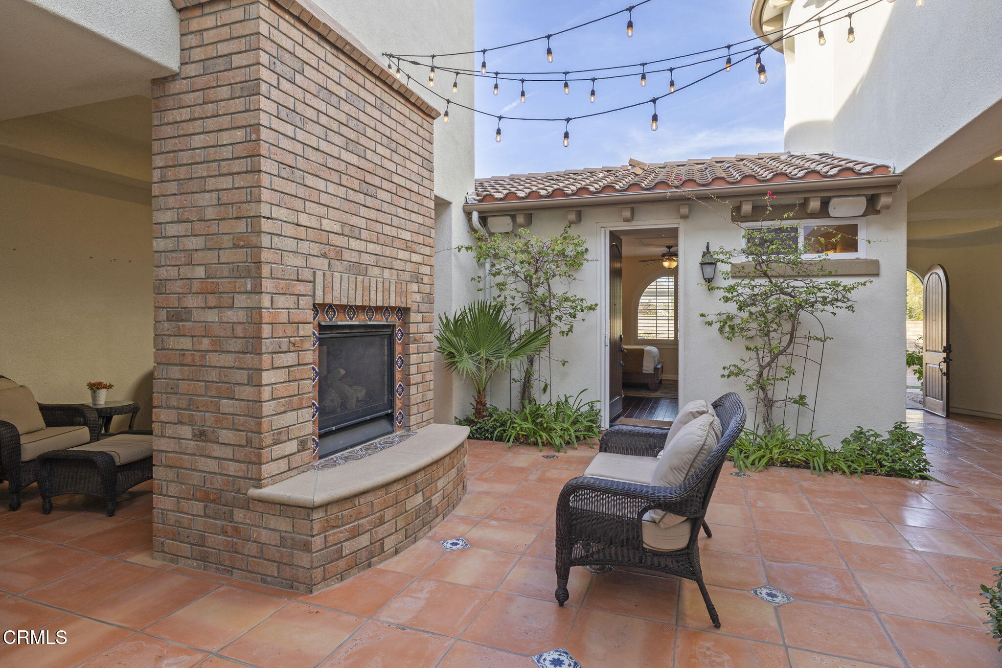 7391 Elk Run Way Moorpark, CA 93021 - Photo 7 of 56 a view of a patio with a table and chairs and a barbeque