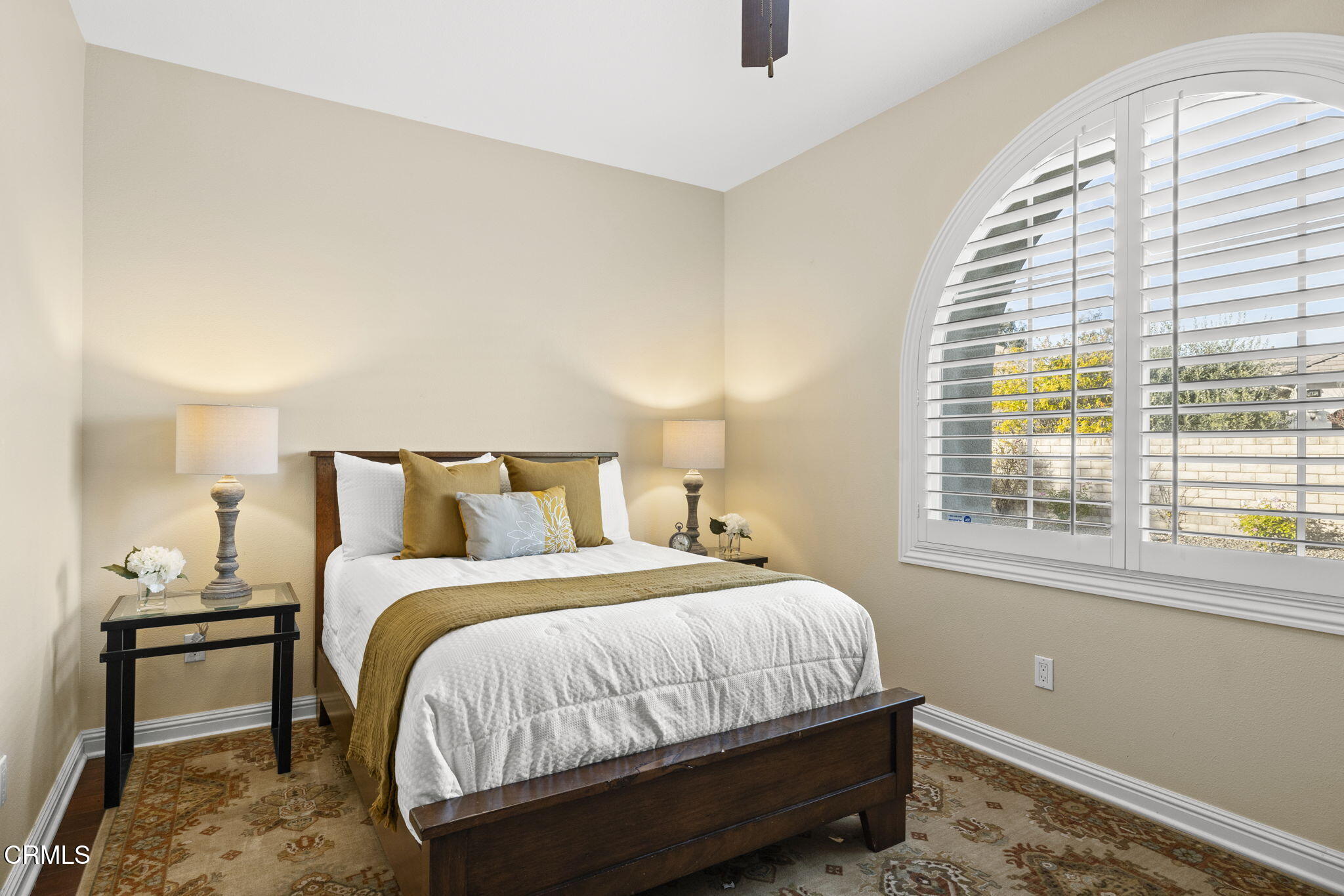 7391 Elk Run Way Moorpark, CA 93021 - Photo 8 of 56 a bedroom with a bed and a window