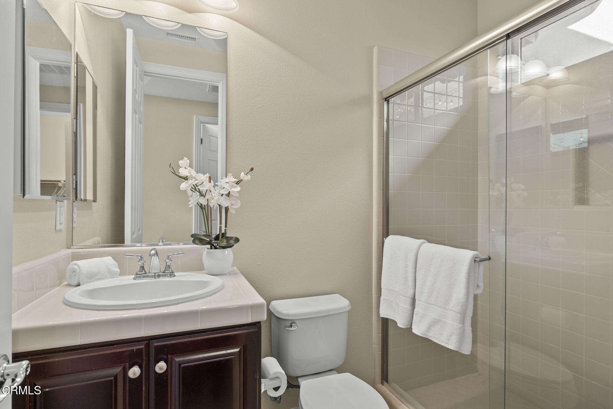 7391 Elk Run Way Moorpark, CA 93021 - Photo 9 of 56 a bathroom with a sink toilet and shower