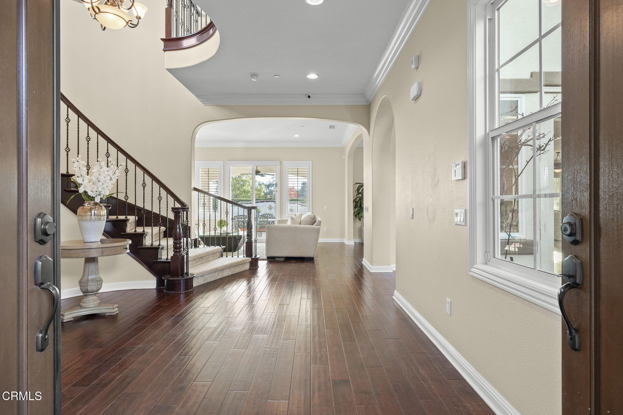 7391 Elk Run Way Moorpark, CA 93021 - Photo 10 of 56 a view of an entryway with wooden floor and a livingroom