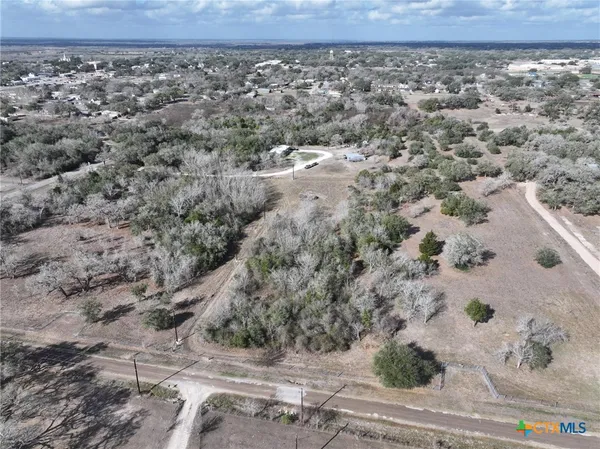 a view of a closet with storage and utility