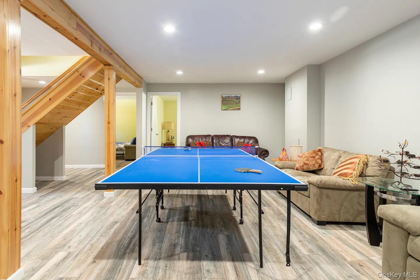 33 South Liberty Road Liberty, NY 12754 - Photo 6 of 12 a room with furniture pool table wooden floor and windows
