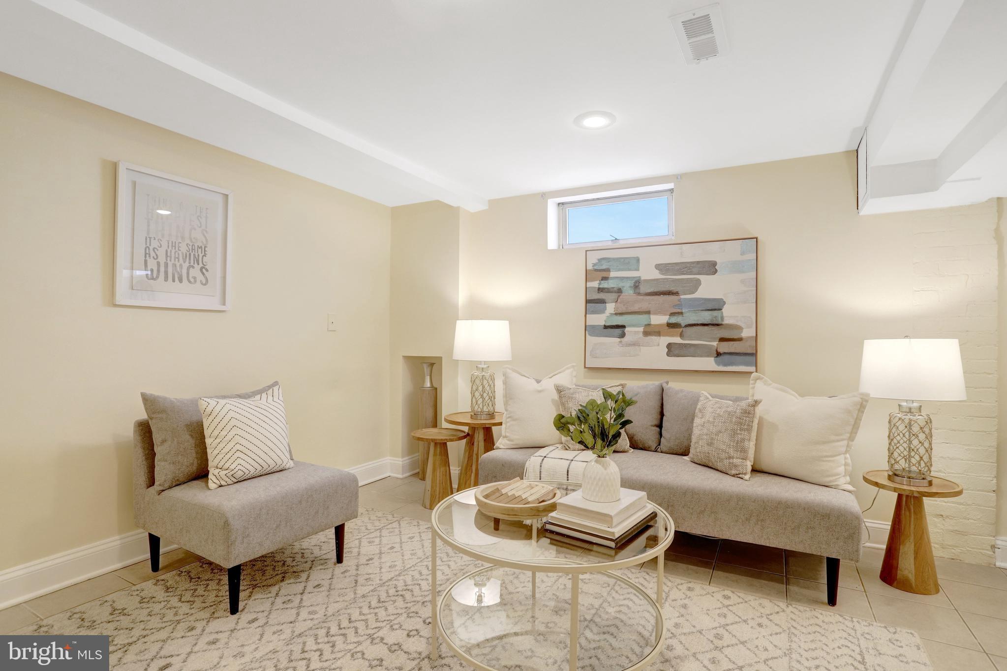 2137 South Pollard Street Arlington, VA 22204 - Photo 17 of 57 a living room with furniture and a potted plant