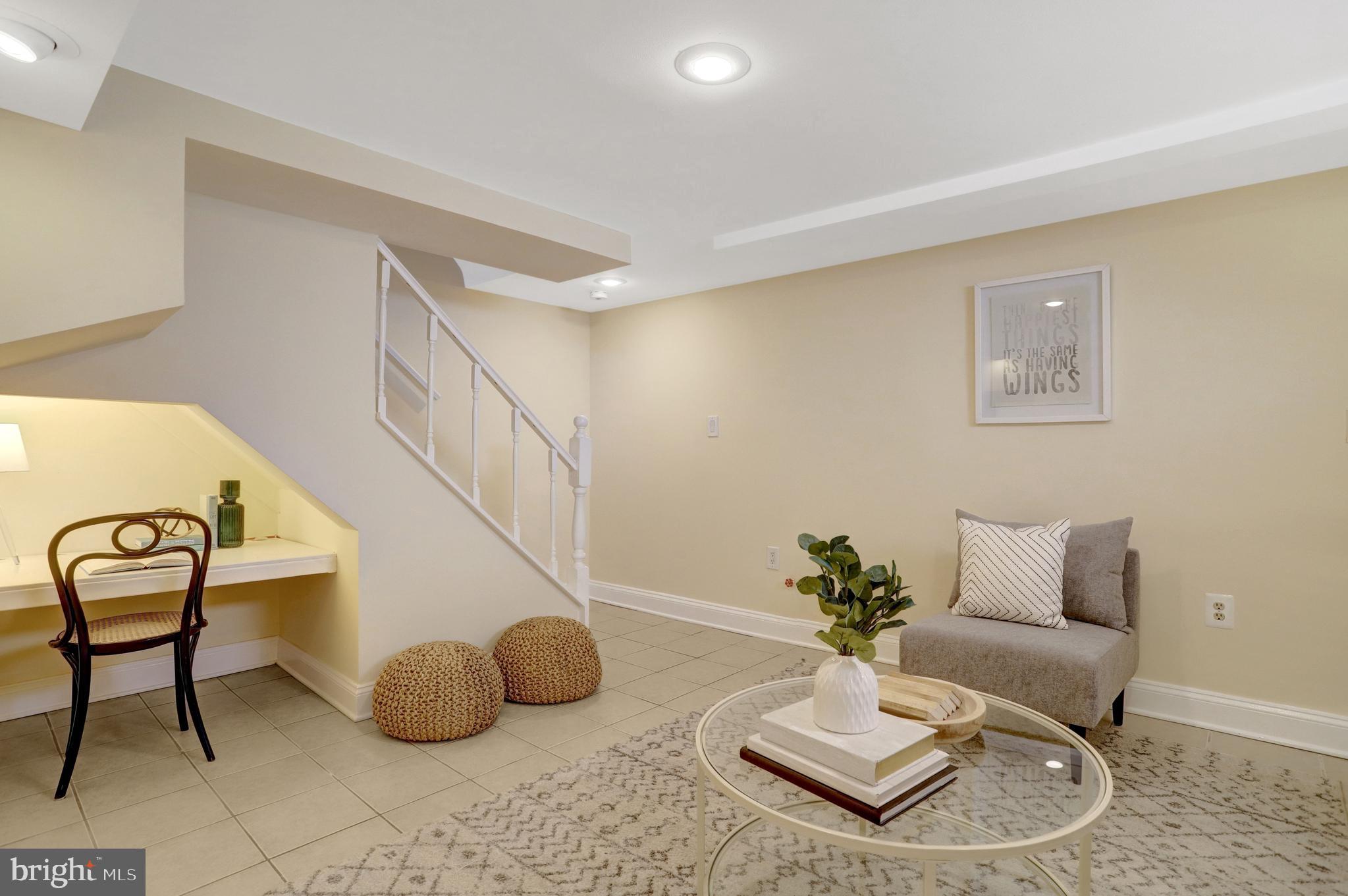 2137 South Pollard Street Arlington, VA 22204 - Photo 20 of 57 a living room with furniture and a potted plant