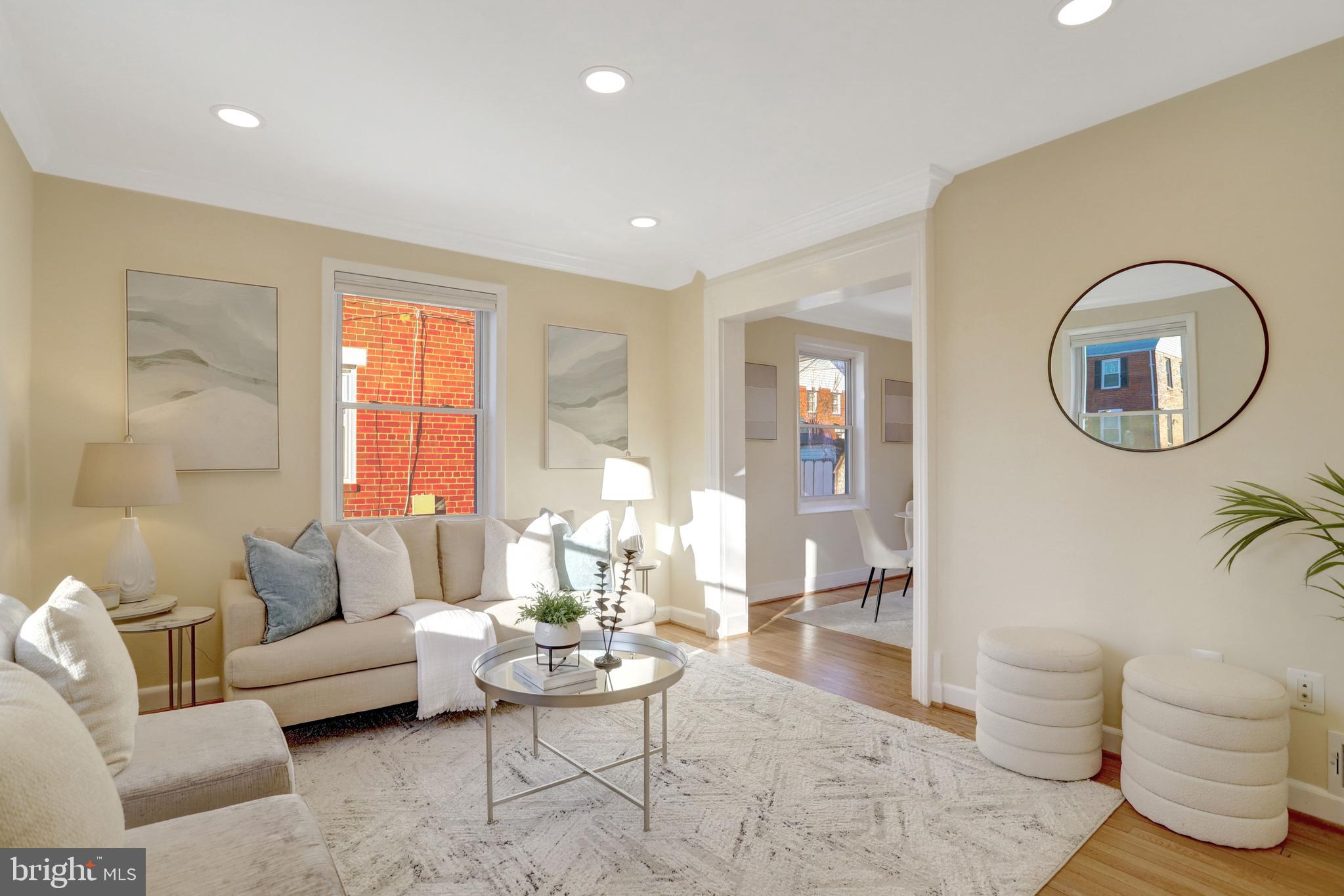 2137 South Pollard Street Arlington, VA 22204 - Photo 2 of 57 a living room with furniture and a large window