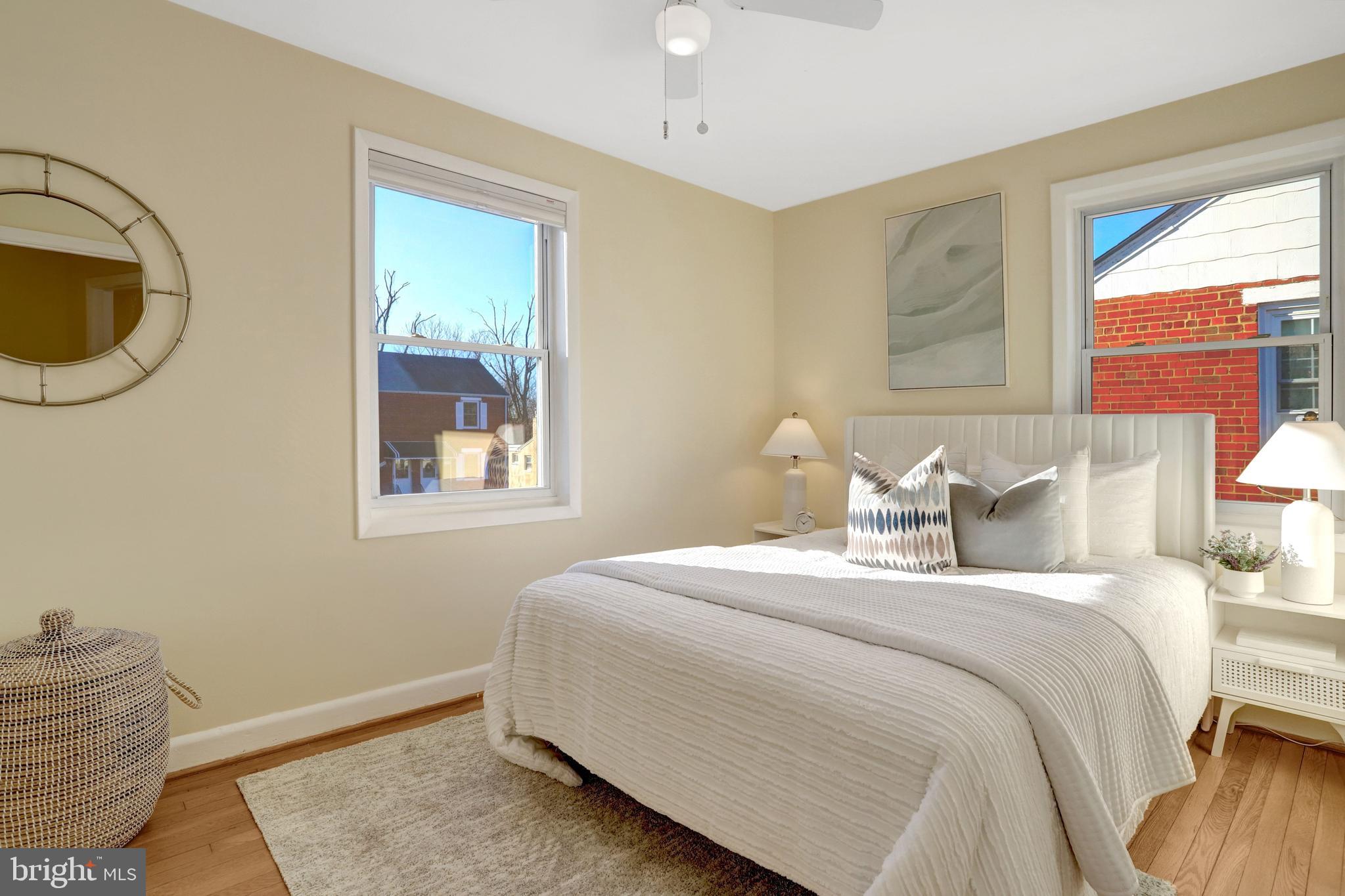2137 South Pollard Street Arlington, VA 22204 - Photo 22 of 57 a bedroom with a bed and a window