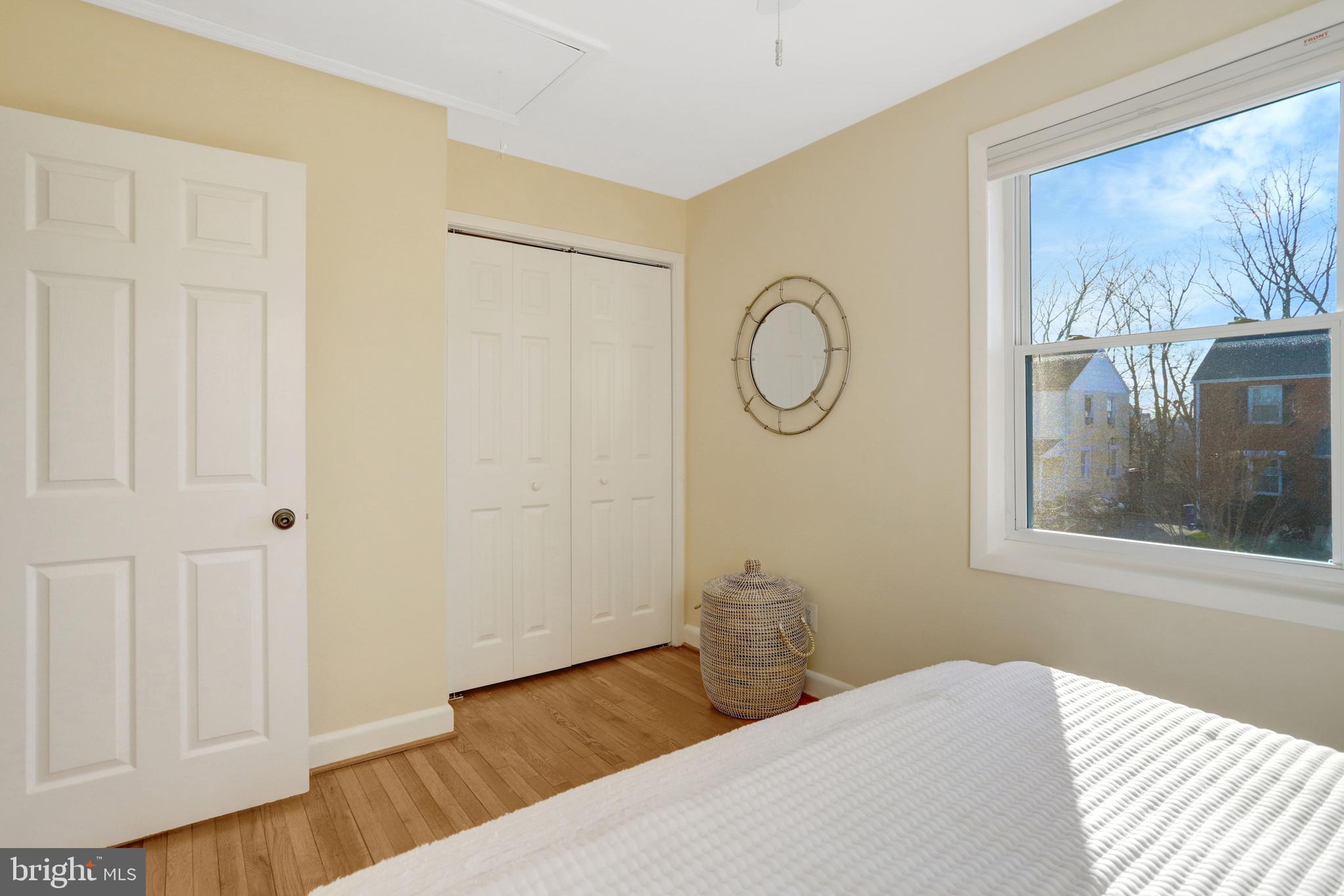 2137 South Pollard Street Arlington, VA 22204 - Photo 23 of 57 a bedroom with a bed and a window