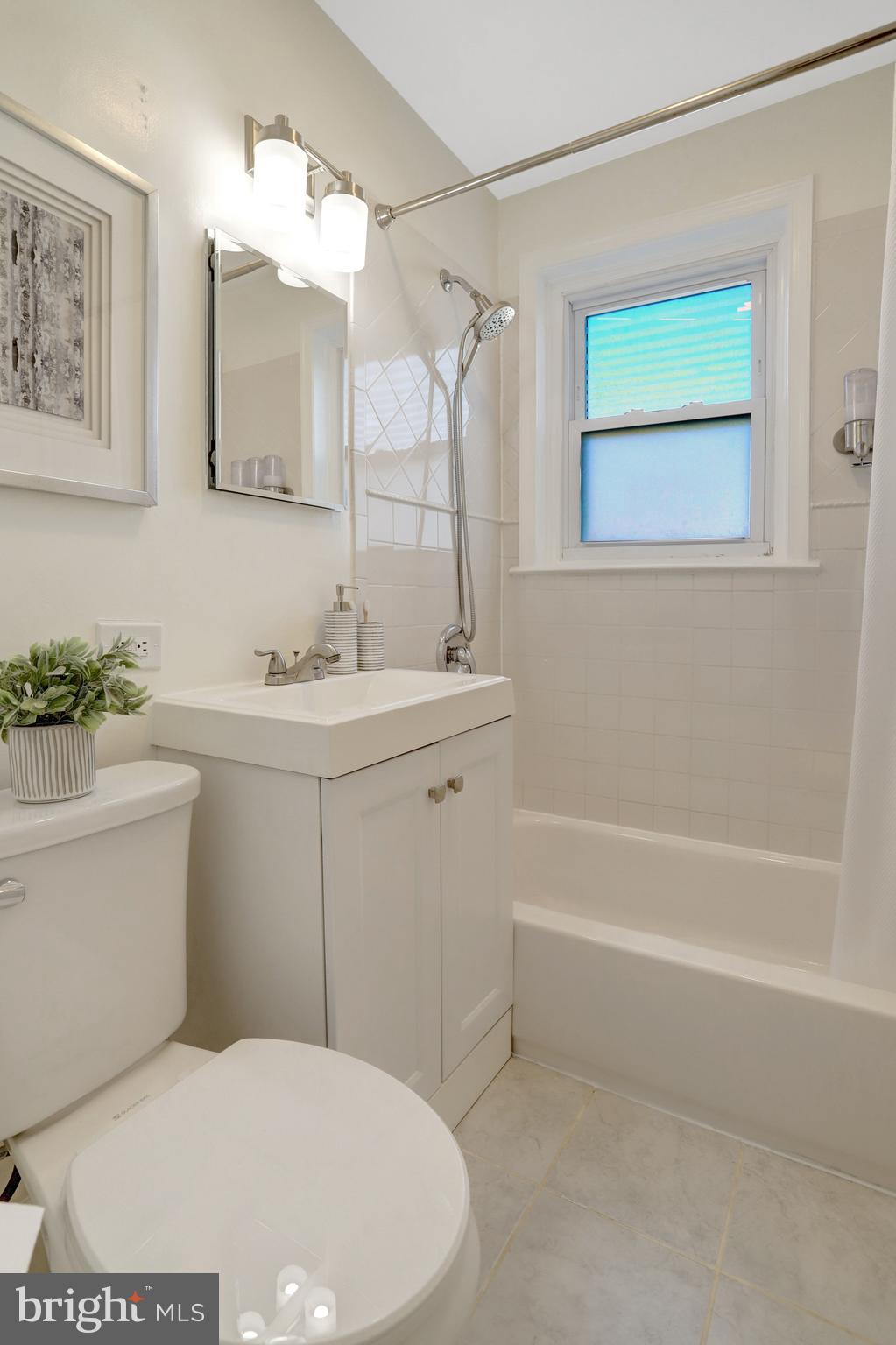2137 South Pollard Street Arlington, VA 22204 - Photo 26 of 57 a bathroom with a sink toilet and shower