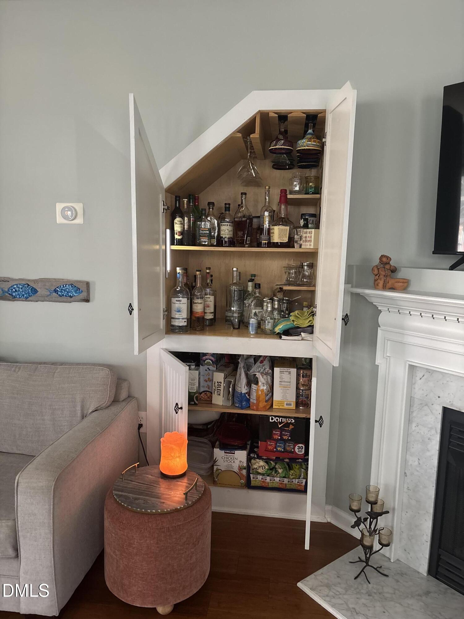 2136 Persimmon Ridge Drive Raleigh, NC 27604 - Photo 3 of 18 a living room with washer and a fireplace