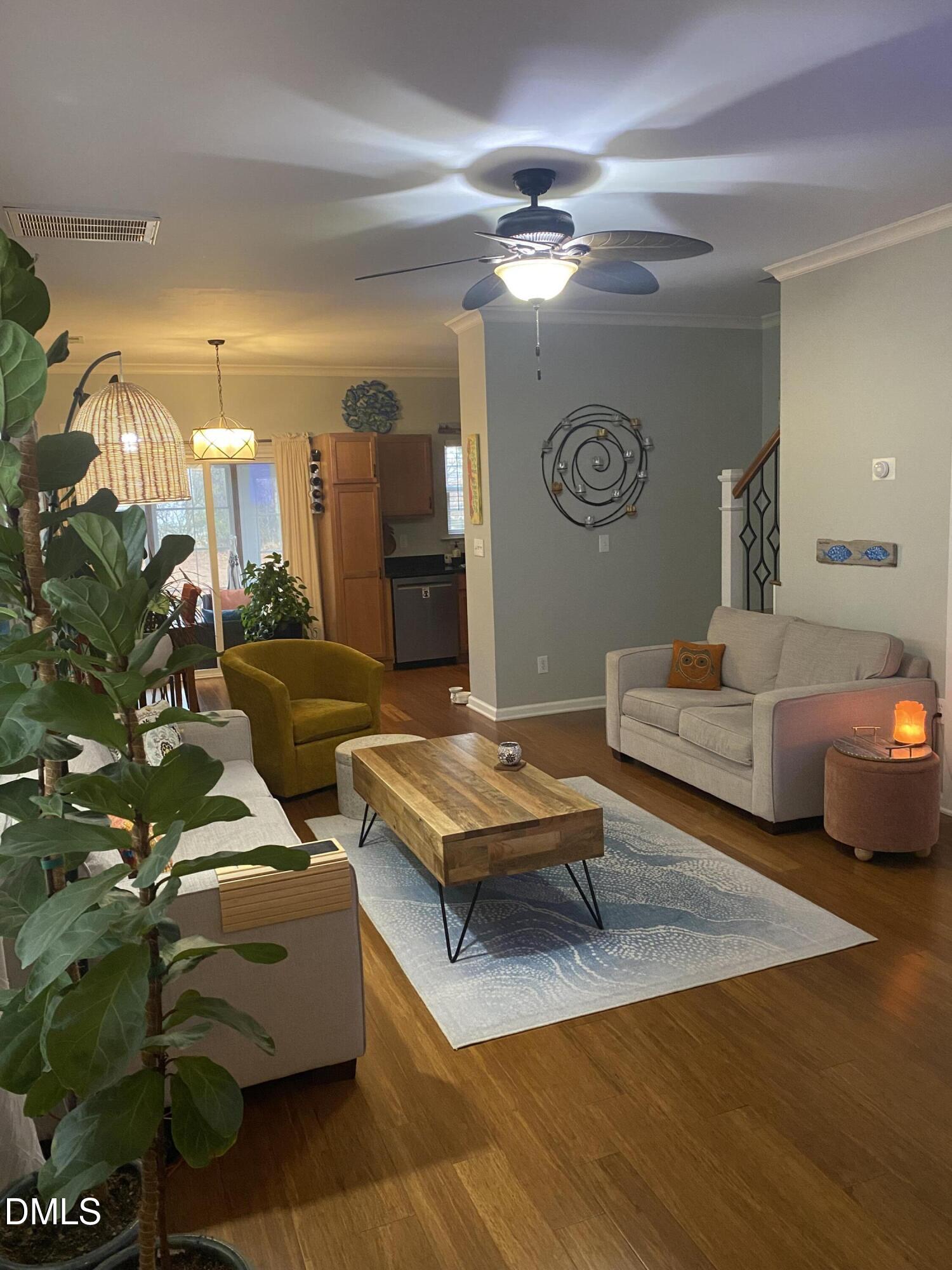 2136 Persimmon Ridge Drive Raleigh, NC 27604 - Photo 4 of 18 a living room with furniture and a table