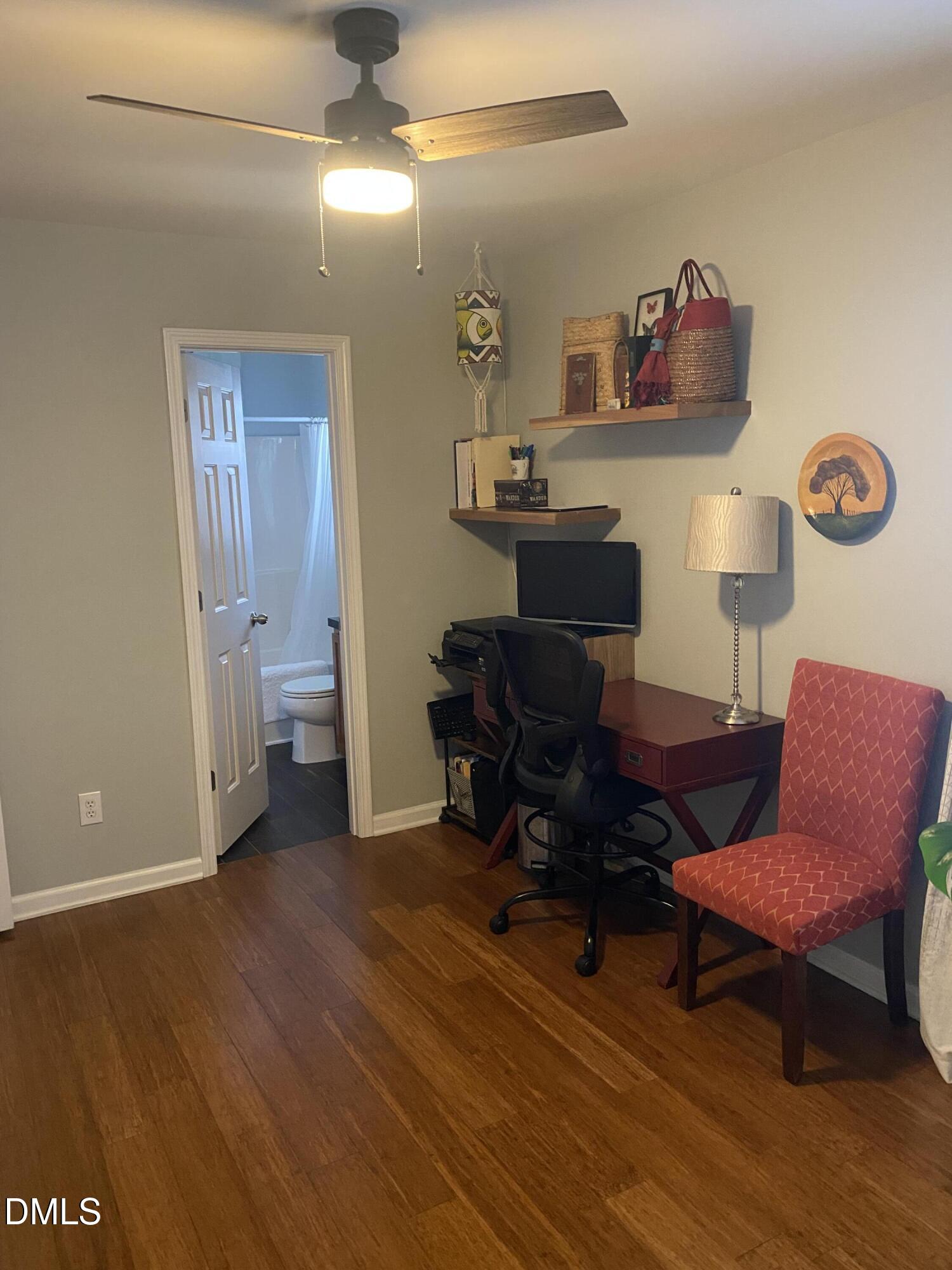 2136 Persimmon Ridge Drive Raleigh, NC 27604 - Photo 8 of 18 a workspace with furniture and wooden floor