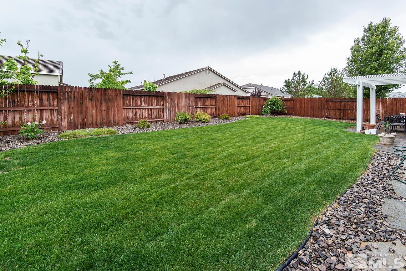 1880 Beringer Way Reno, NV 89521 - Photo 3 of 3 a front view of a house with yard