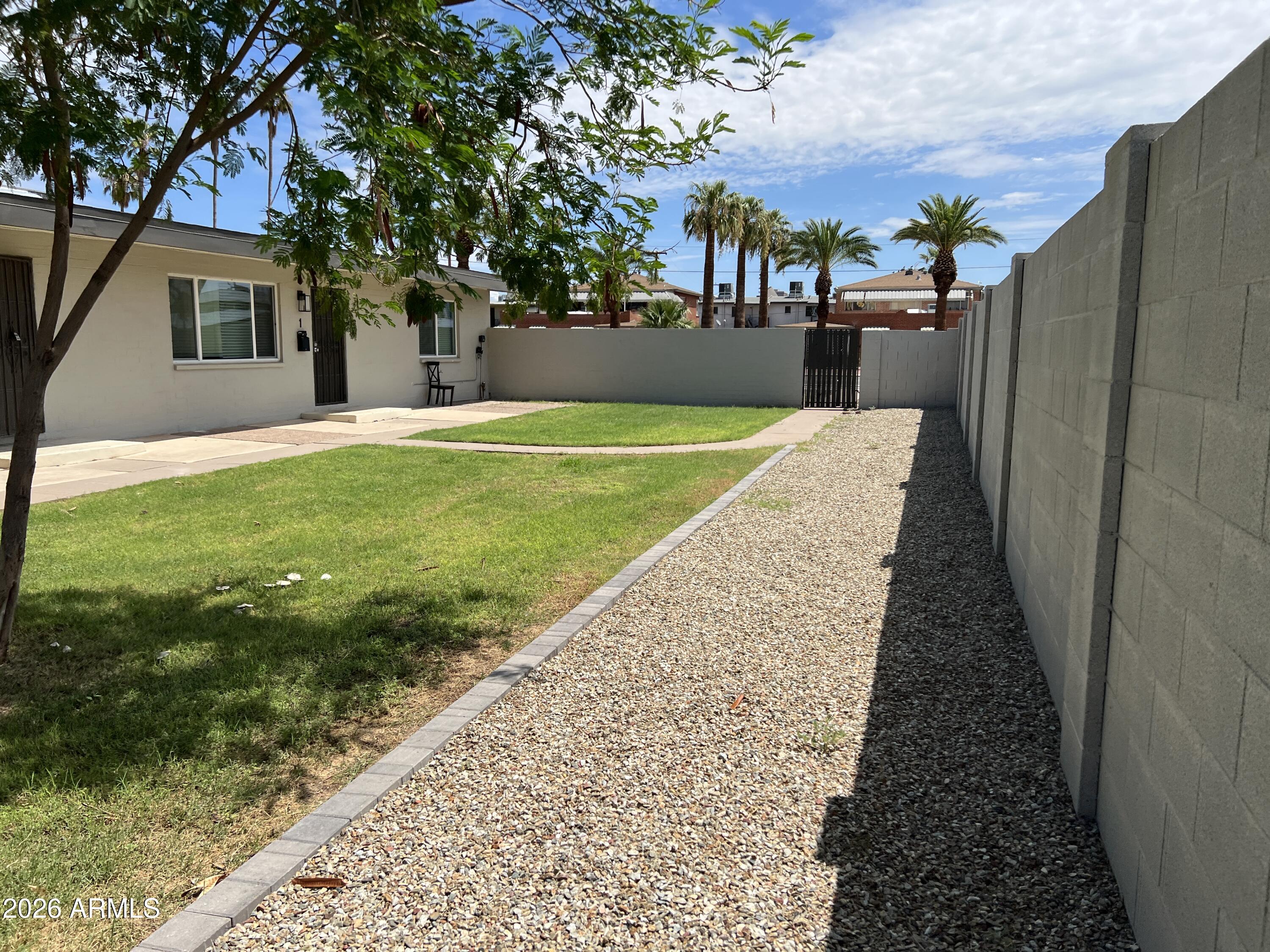3630 North 15th Avenue Phoenix, AZ 85015 - Photo 2 of 12 a view of a backyard of the house